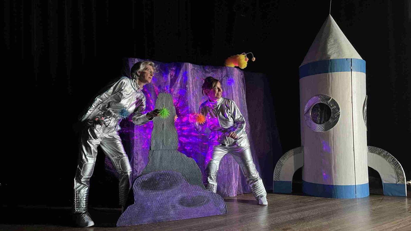 De avontuurlijke reis naar de paarse planeet!