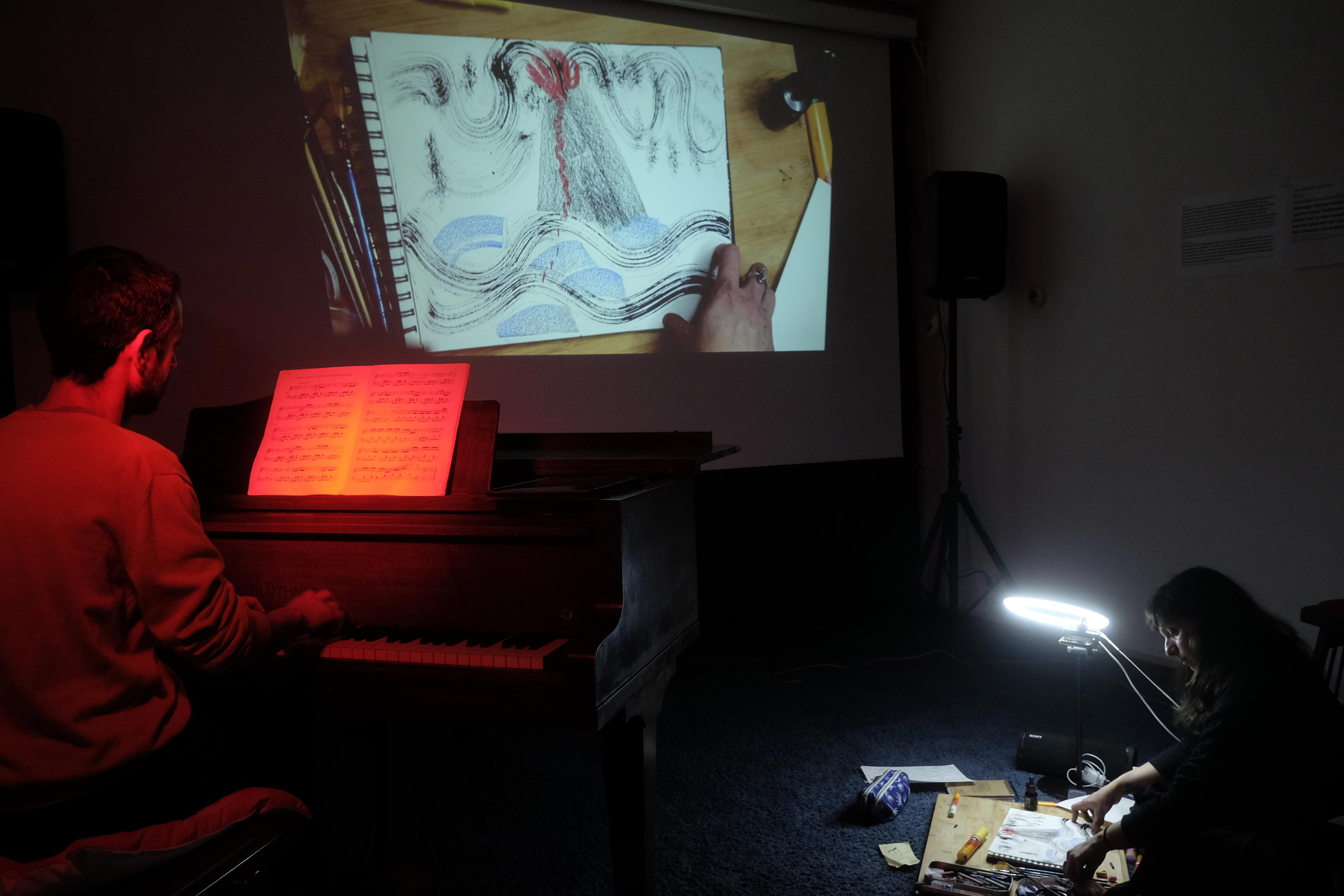 Een voorstelling met live muziek, tekeningen en verteller